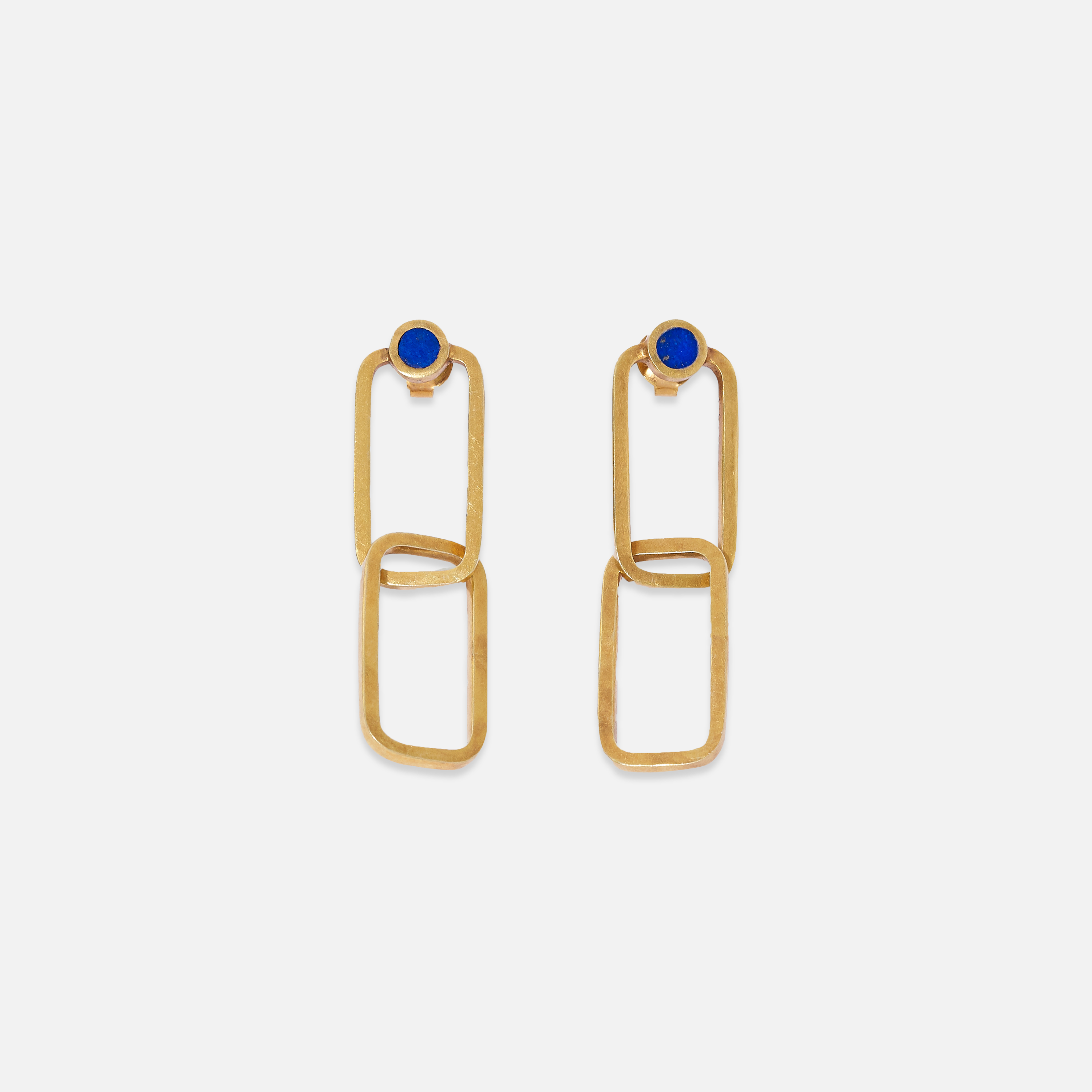 A pair of gold-plated sterling silver earrings with lapis lazuli accents, featuring a geometric design with two connected rectangular shapes and a single blue stone at the top.