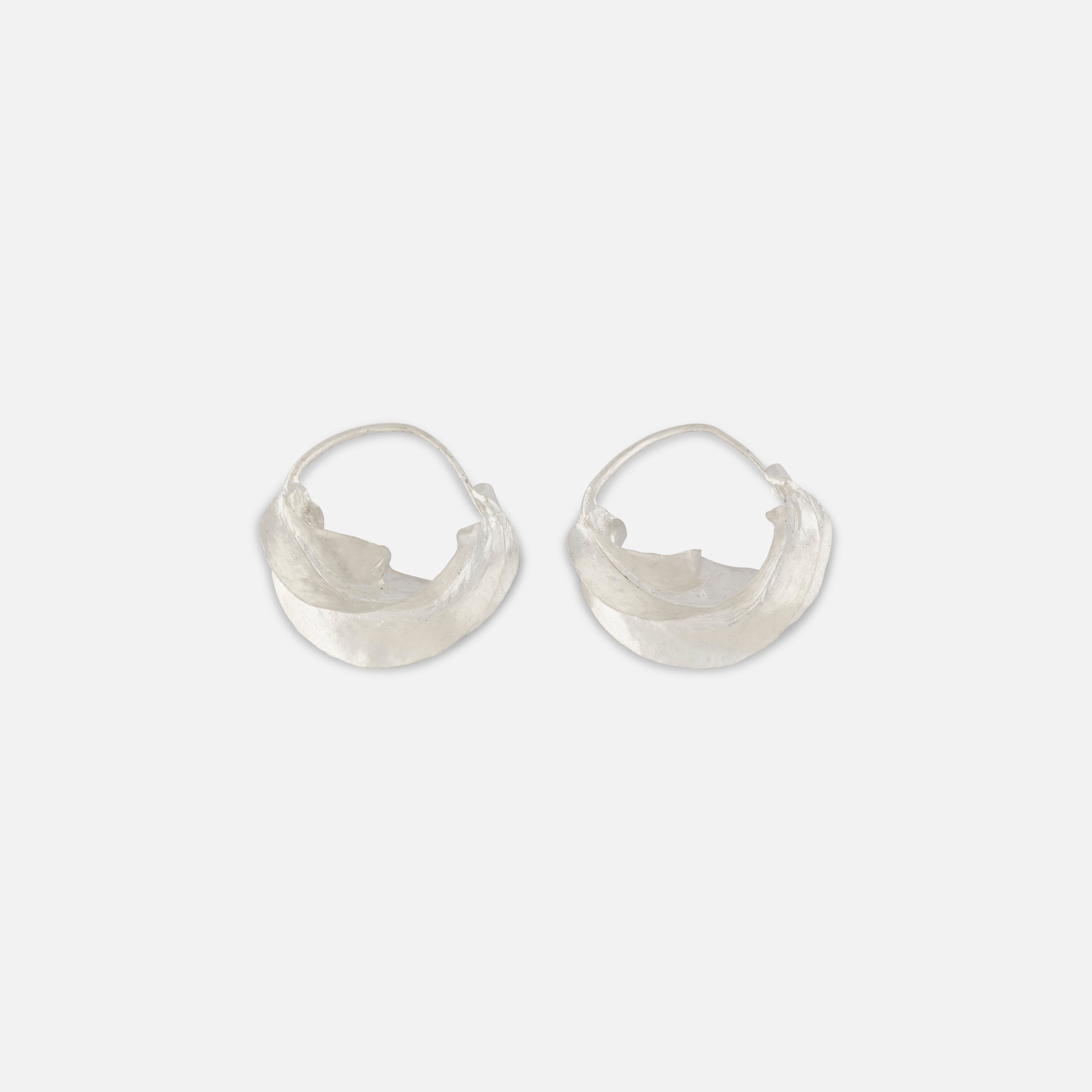 Pair of sterling silver hoop earrings on a white background, size small