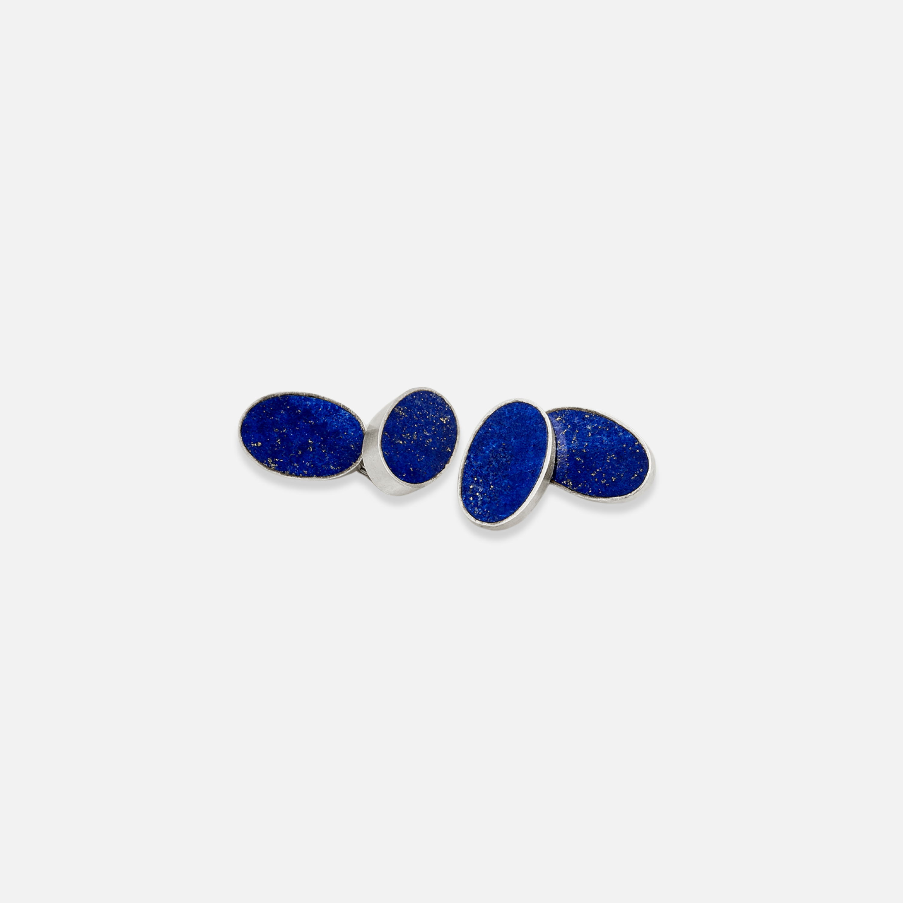 A set of double cufflinks with blue lapis lazuli inset into silver settings, displayed against a white background.