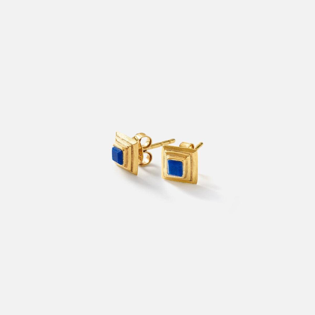 A pair of gold geometric stud earrings with square blue inlays, shown on a clean white background.