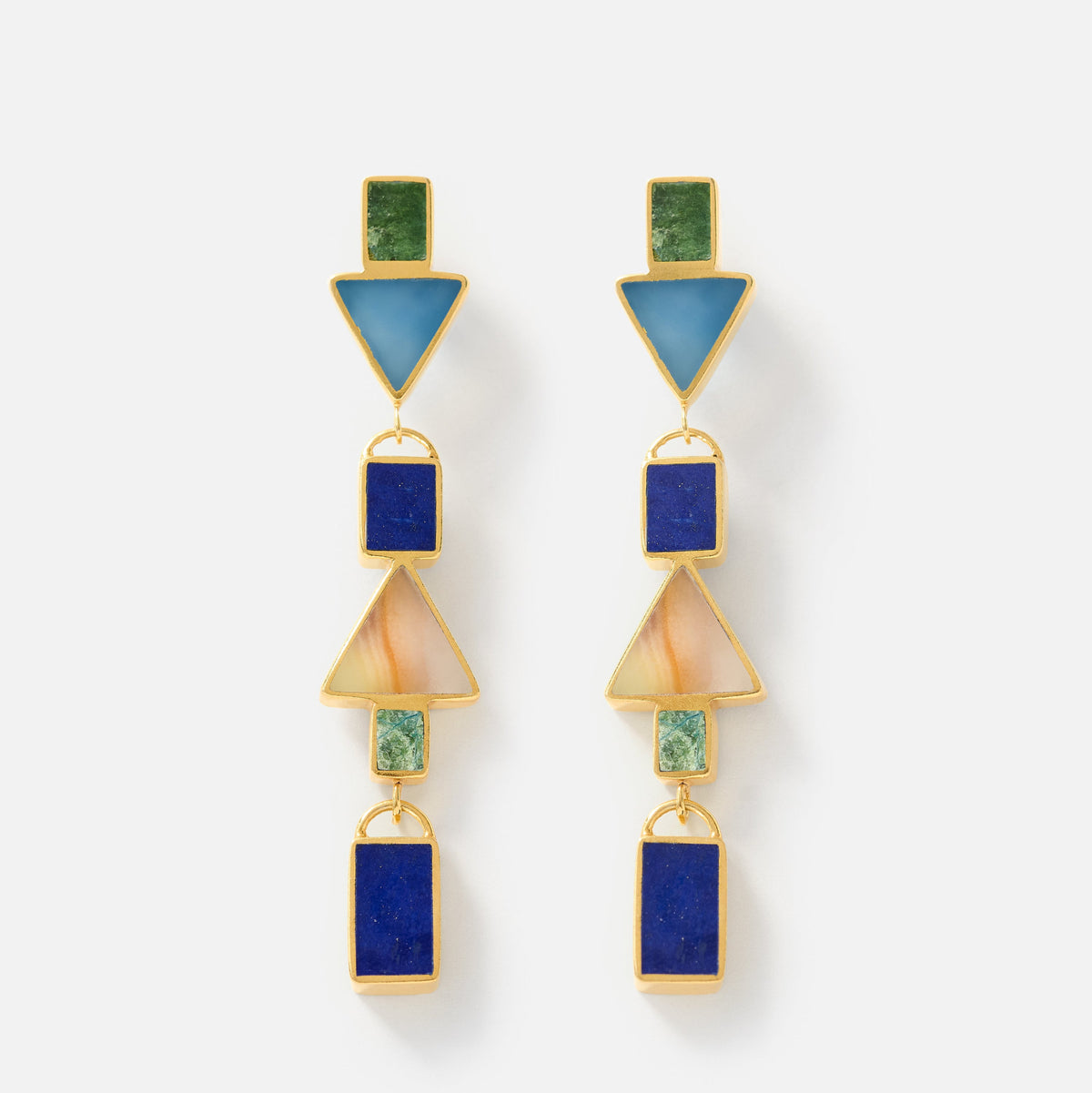 A pair of gold geometric drop earrings featuring blue, green, and peach stone inlays on a clean white background.