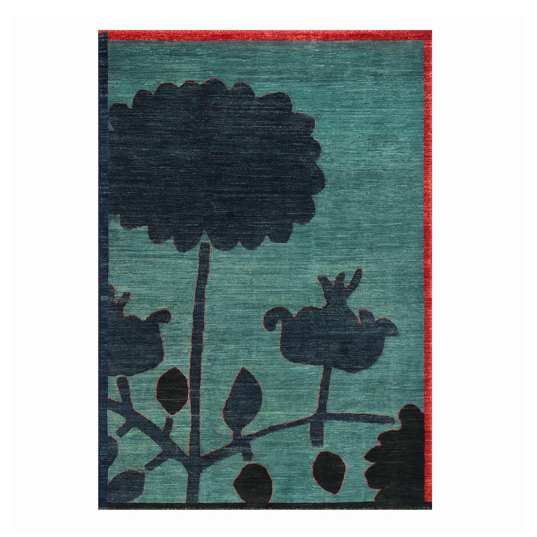 Blue floral wool rug. 
This wool rug depicts the the flower and fruit of the iconic pomegranate tree in rich blue hues, while a bright red trim and contrasting borders add a bold accent of colour.