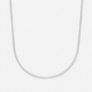 A sterling silver handmade chain necklace with a clasp, laid out on a plain background.