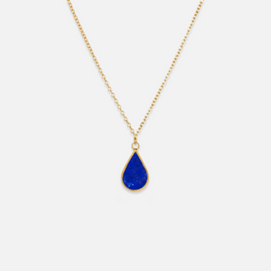 A gold plated sterling silver necklace with a teardrop-shaped blue Lapis Lazuli pendant.