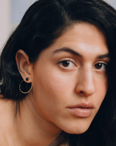 Model wears ISHKAR's small asman studs