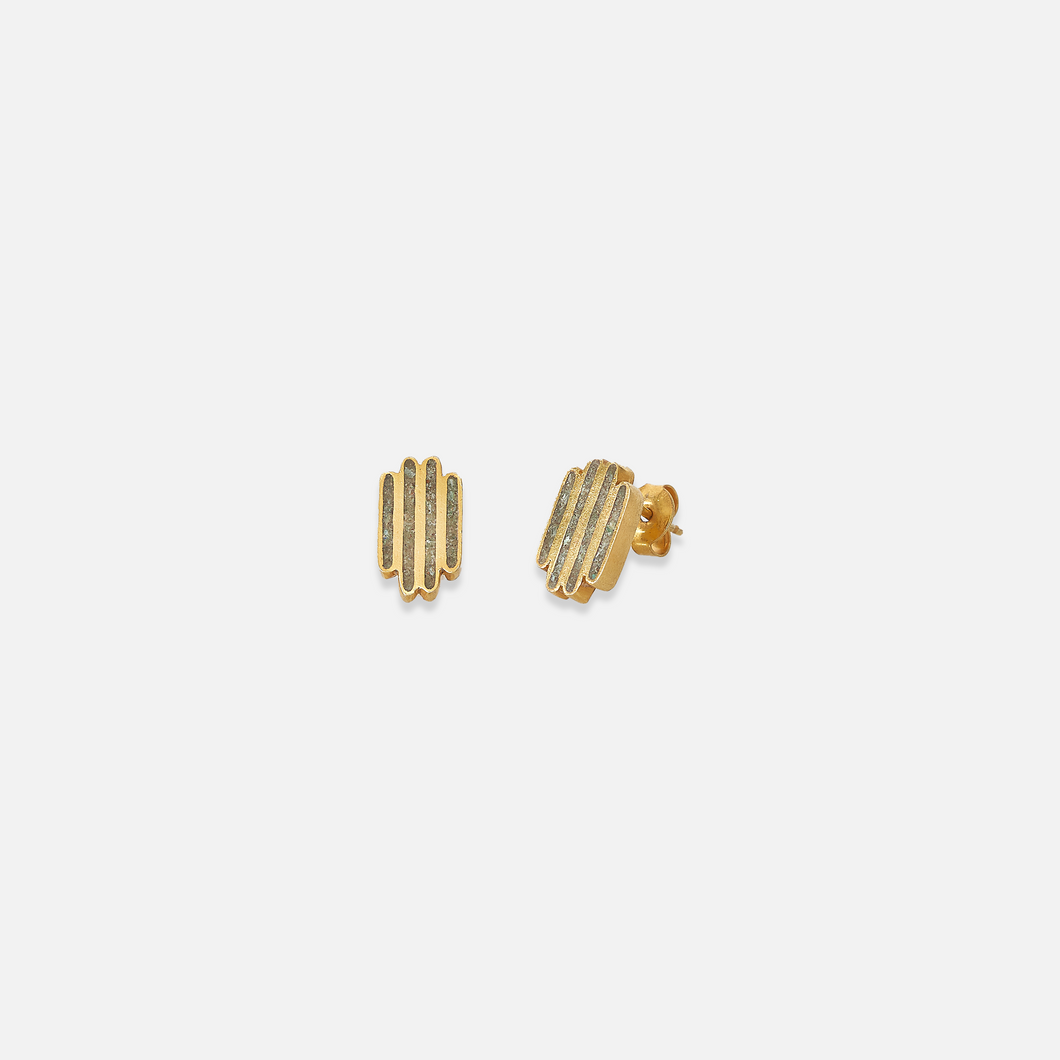 A pair of gold-colored stud earrings set with a chrysocolla, against a white background.