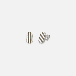 A pair of silver stud earrings set with chrysocolla, against a white background.