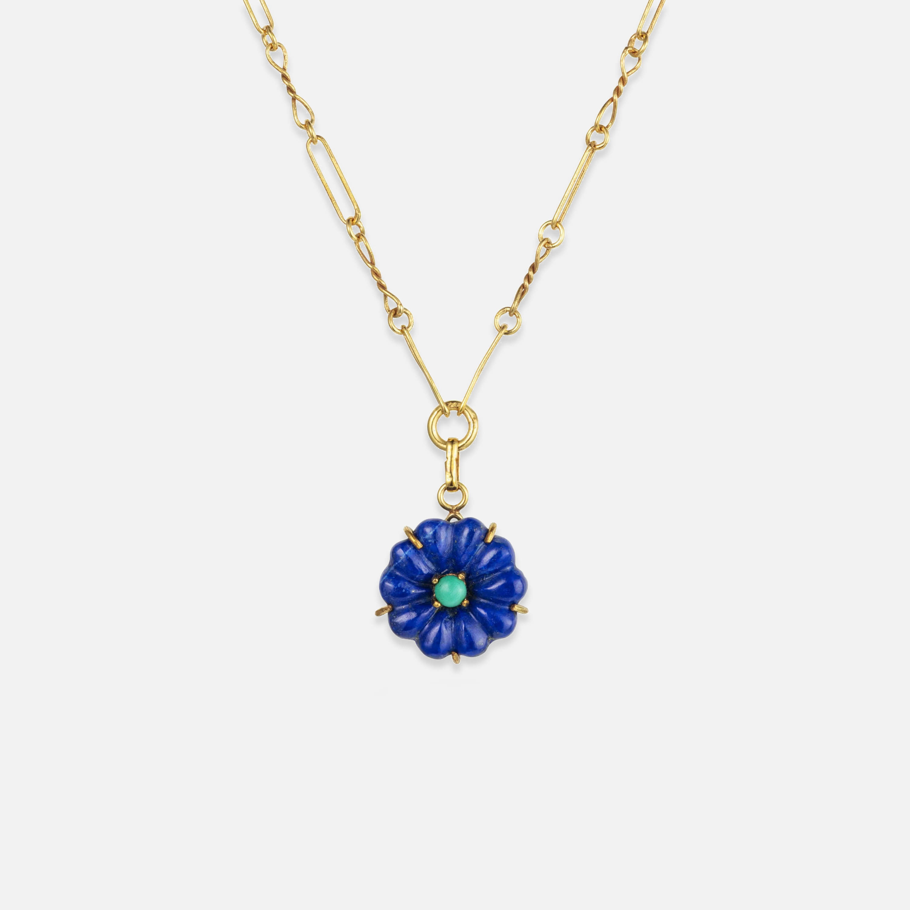 A gold-plated necklace with a chain link and a blue lapis lazuli flower pendant featuring a malachite centre