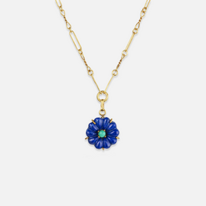 A gold-plated necklace with a chain link and a blue lapis lazuli flower pendant featuring a malachite centre