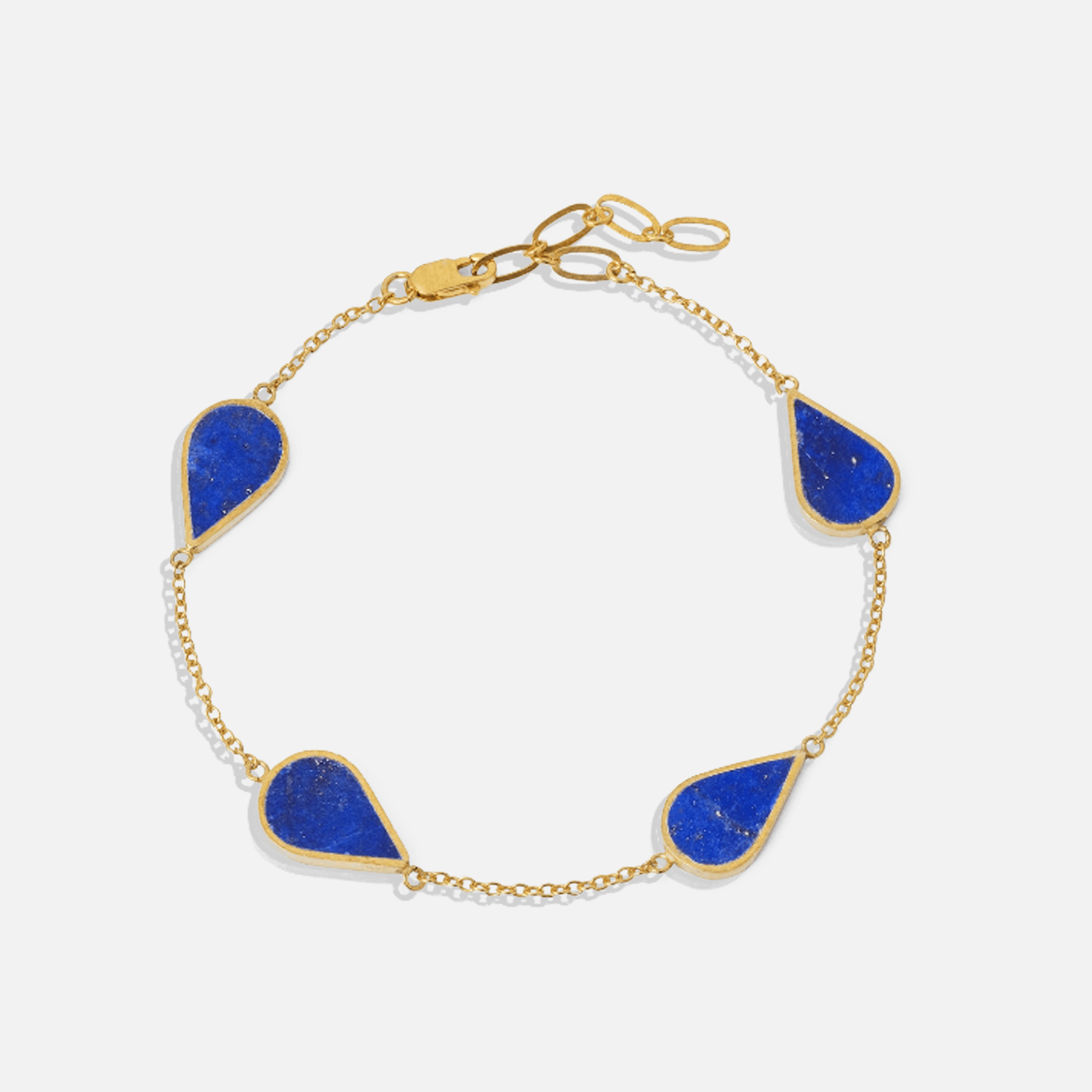 ISHKAR bracelet with gold plated sterling silver and blue Lapis Lazuli stones, featuring an adjustable clasp.