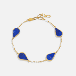 ISHKAR bracelet with gold plated sterling silver and blue Lapis Lazuli stones, featuring an adjustable clasp.
