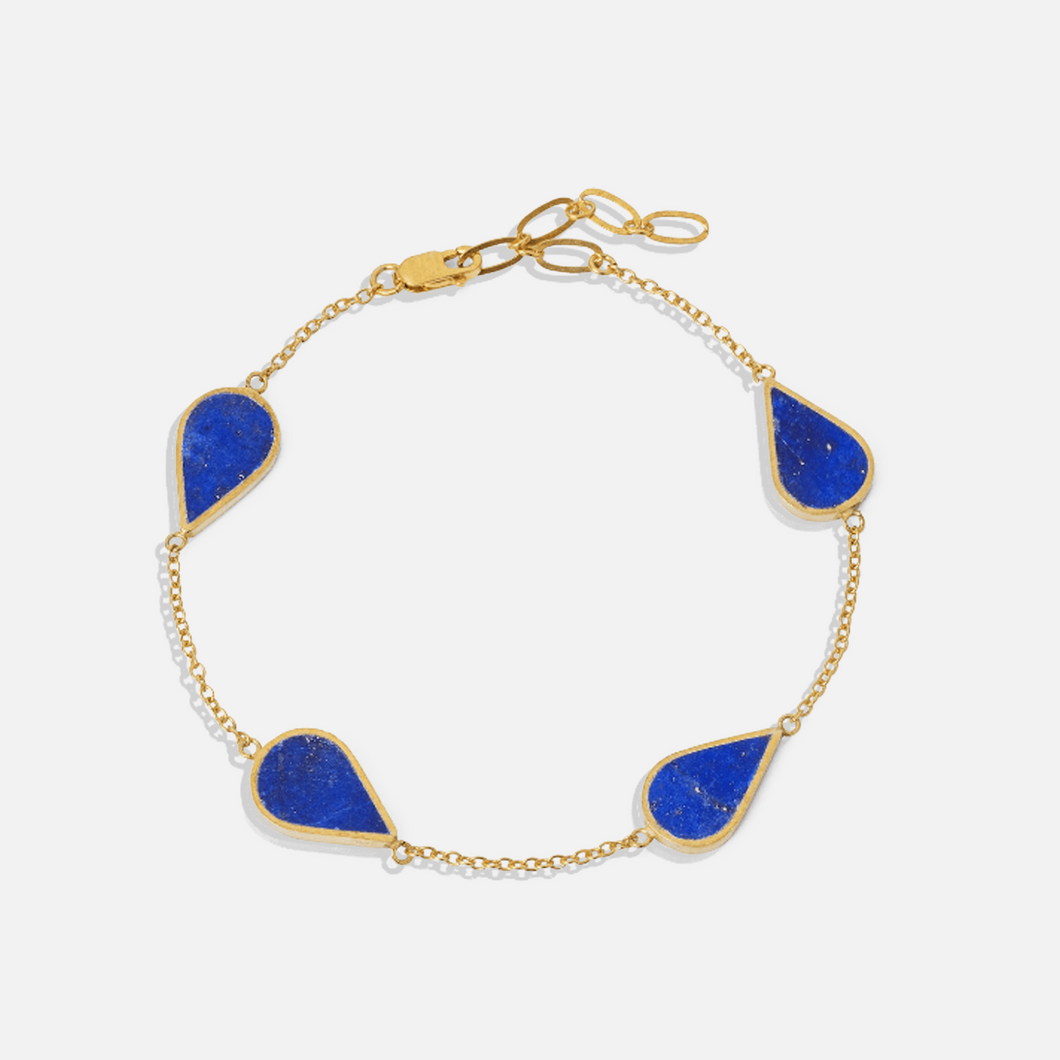 ISHKAR bracelet with gold plated sterling silver and blue Lapis Lazuli stones, featuring an adjustable clasp.