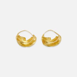 A pair of gold-colored hoop earrings with a twisted design, handcrafted.