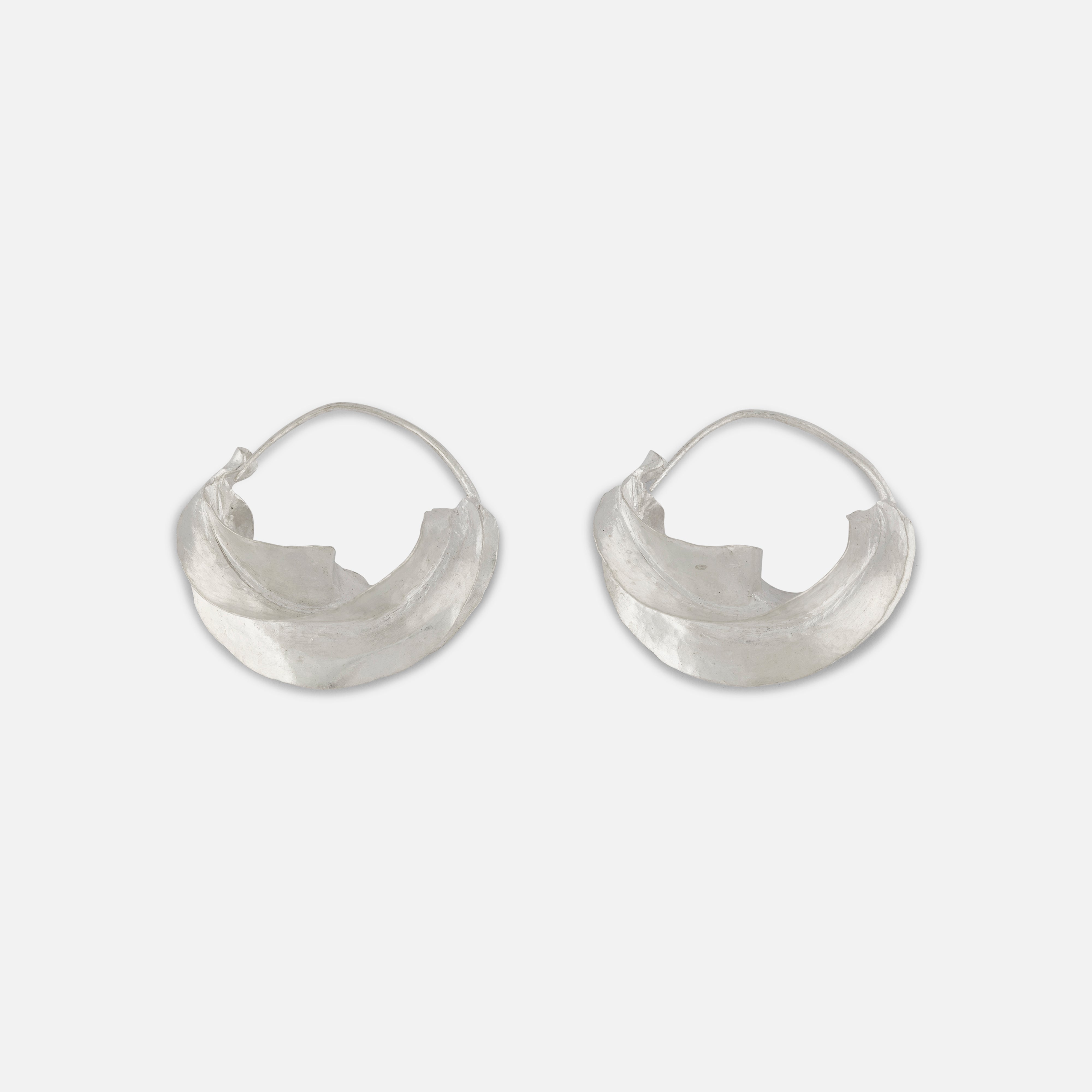 Pair of sterling silver hoop earrings on a white background, size medium