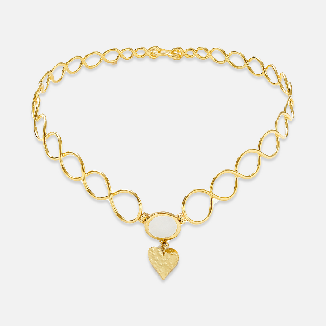 A gold-plated sterling silver choker necklace with a heart-shaped pendant and marble inlay details.