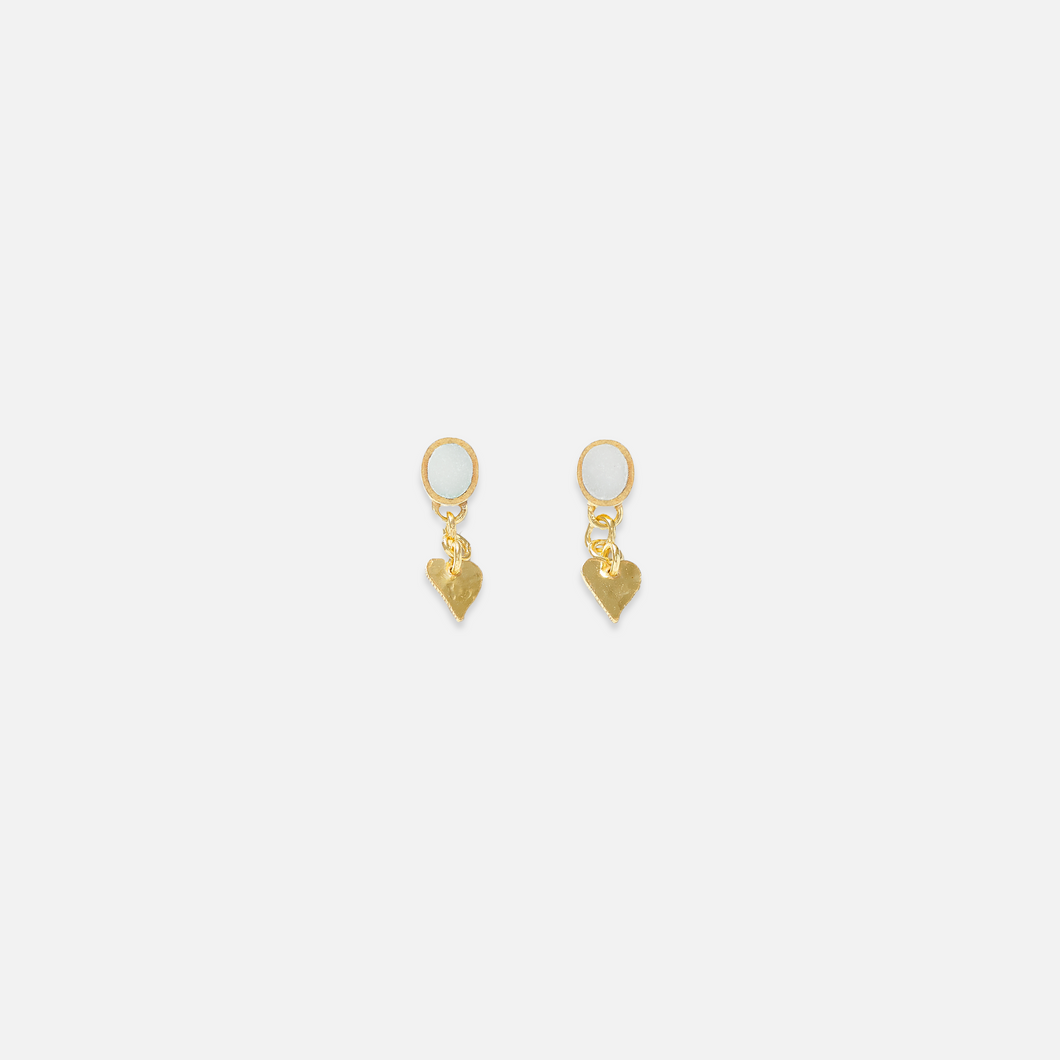 A pair of gold-plated sterling silver drop earrings with white marble studs and small heart pendants.