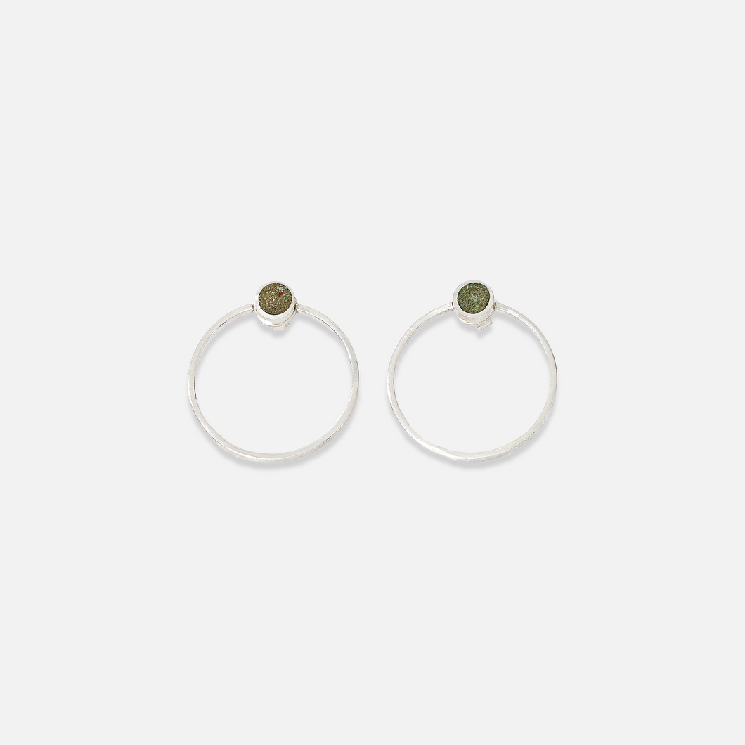 A pair of sterling silver earrings with a Bamiyan turquoise stud detail at the top, displayed against a white background.